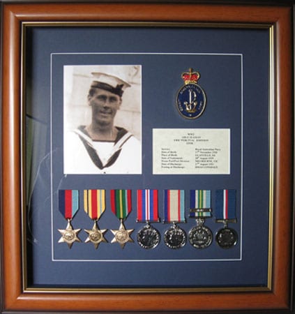 https://b1676622.smushcdn.com/1676622/wp-content/uploads/2020/08/navy-framing-medals-and-memorabilia-tania-buck-adelaide.jpg?lossy=1&strip=1&webp=1